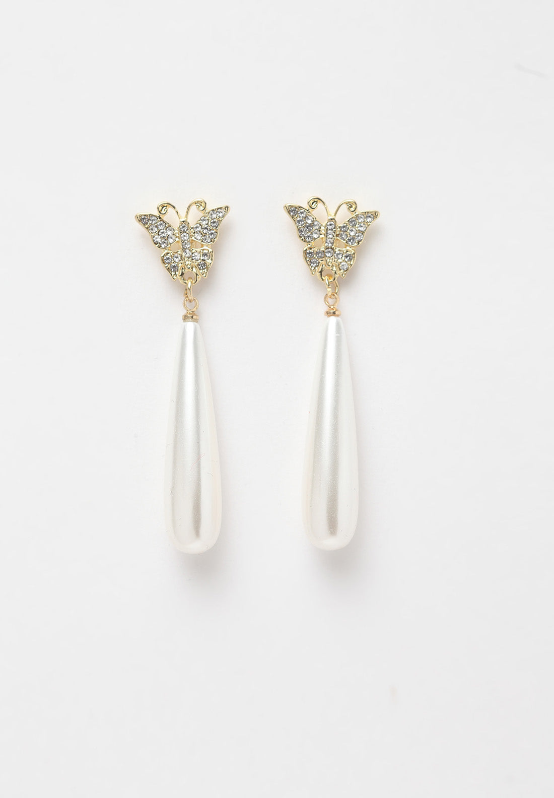 Boucles d'oreilles papillon argentées avec perles et cristaux