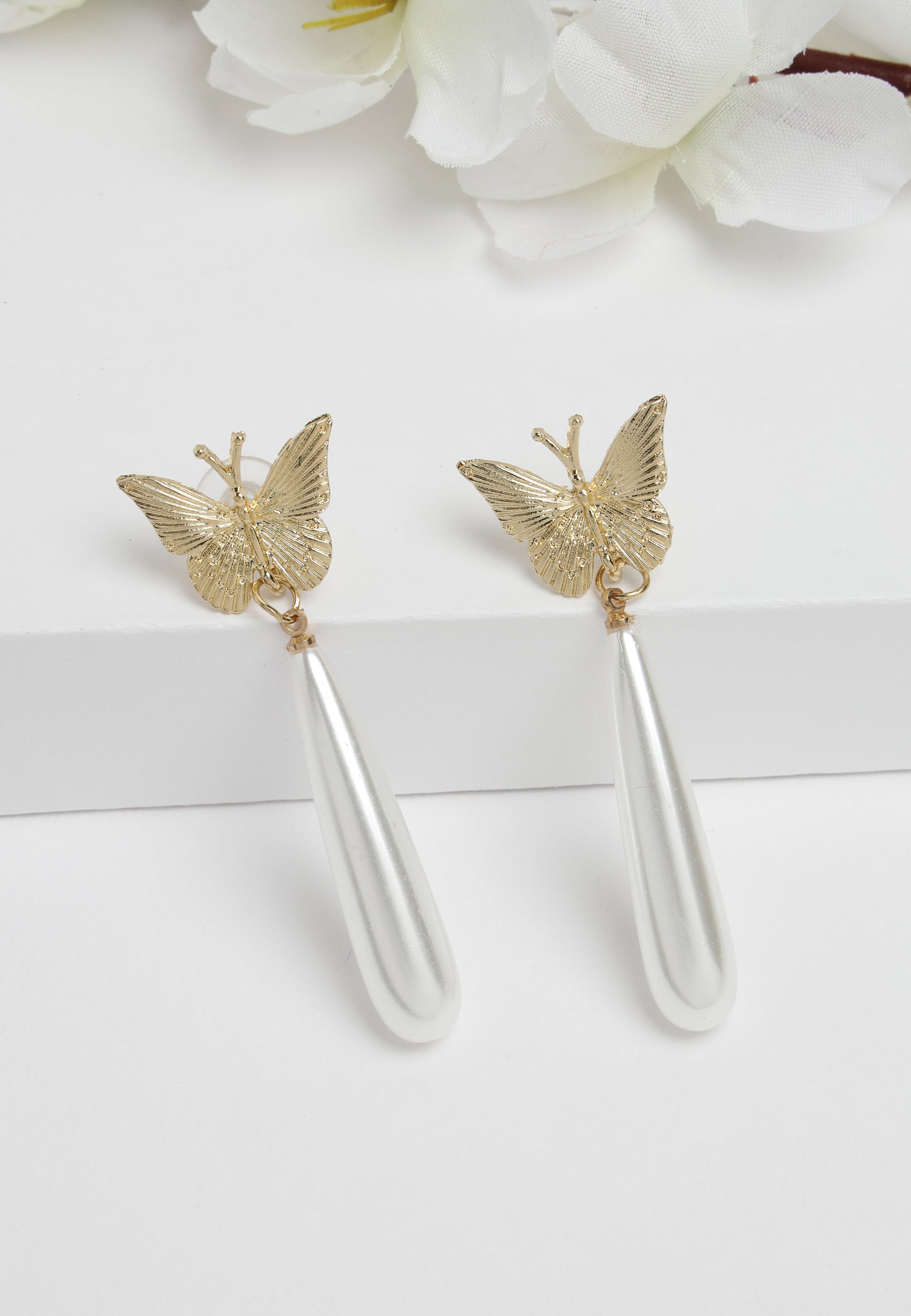 Boucles d'oreilles en cristal et perles papillon blanches